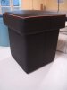Pouf en simili noir